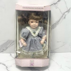 Collectible memories Porcelain doll.